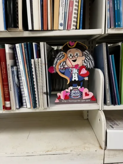 At the State University of New York, Oswego, Ben played a role in the library’s ‘Penfield Loves You Day’ scavenger hunt, hiding in their Government Documents collection.